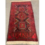 An Afghan rug 100 cm x 180 cm