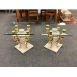 A pair of Barker and Stonehouse Grecian style lamp tables, with glass tops,