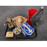 A tray of carved tribal figure, champagne bucket, vintage tin, glass perfume bottle,