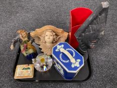 A tray of carved tribal figure, champagne bucket, vintage tin, glass perfume bottle,
