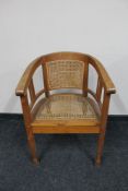 A pine framed bergere tub chair
