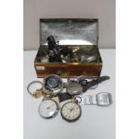 An antique tin of wrist watches and chrome cased pocket watches