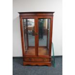 A Regency style glazed display cabinet