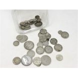 A collection of silver six pence pieces, American Dime, half dollar, quarter dollar,