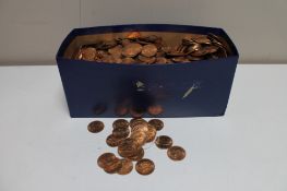 A box of mid 20th century un-circulated pennies and half pennies