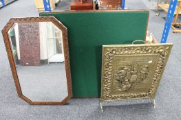 An Edwardian oak framed mirror together with a brass fire screen and a folding card table
