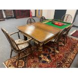 An oak snooker dining table, by Riley Limited, Ackrington, together with oak score board, five cues,