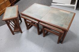 A mid century teak tiled coffee table fitted with two beneath and matching magazine rack,