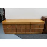 A twentieth century Mackintosh furniture three door sideboard base