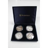 Four Sterling silver Westminster coin collection '50 dollar' commemorative aircraft coins, cased.
