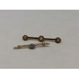 A gold split pearl and diamond bar brooch and a 9ct gold diamond set bar brooch (2)