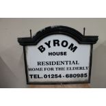 A painted metal hanging illuminated twin sided sign - Byrom House Residential Home for the Elderly