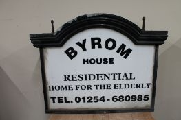 A painted metal hanging illuminated twin sided sign - Byrom House Residential Home for the Elderly