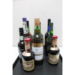 A tray of ten bottles of alcohol to include Drambuie, Port,