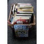 A box of books and DVD's of railway interest