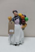 A Royal Doulton figure - Biddy Penny Farthing HN 1843