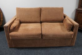 A contemporary two seater bed settee
