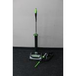 A G-tech Air ram electric cordless vacuum together with a 22 volt electric cordless hand held