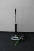 A G-tech Air ram electric cordless vacuum together with a 22 volt electric cordless hand held