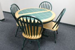 A contemporary pine pedestal kitchen table,