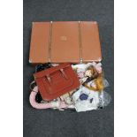 A luggage case together with a box of leather satchel, vintage hair dryer, ankle boots,