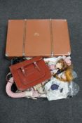 A luggage case together with a box of leather satchel, vintage hair dryer, ankle boots,