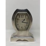 A good quality Art Deco silver cased 8 day mantel clock,