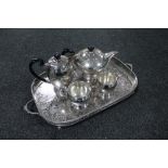 A four piece silver plated tea service on gallery tray