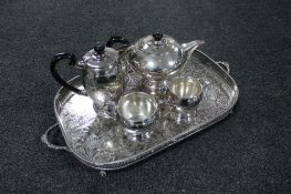 A four piece silver plated tea service on gallery tray