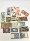 A collection of paper bank notes to include Chinese Central bank notes, Reich marks etc.