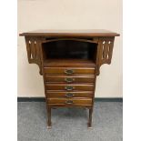 A late Victorian mahogany music chest,