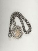 A graduated silver watch chain with silver fob, 33.4g.