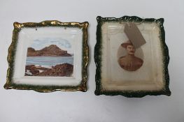 Two antique pottery plates depicting The Giant's Causeway and Baden Powell