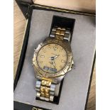 A gents stainless steel and gold plated Seiko Sports 150 quartz wristwatch in box