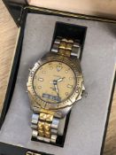 A gents stainless steel and gold plated Seiko Sports 150 quartz wristwatch in box