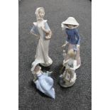 Four Nao figures depicting lady's and children