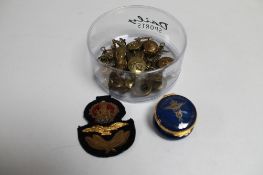 A box of militaria badges, buttons, sew on patch,