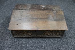 An antique oak bible box dated 1688
