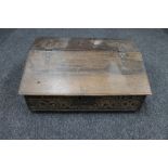 An antique oak bible box dated 1688