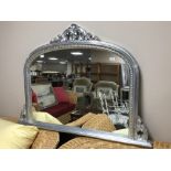 A silvered framed overmantel mirror,