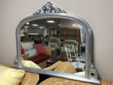 A silvered framed overmantel mirror,