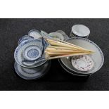 A tray of Chinese rice bowls, spoons,