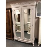 A Laura Ashley double door mirror wardrobe, painted,