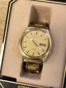 A gents vintage gold plated Seiko 5 automatic calendar wristwatch in box