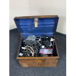 A tin trunk of electricals and cabling