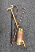 A copper and brass pot,