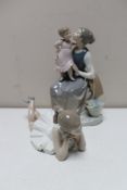 Two Nao figures - mother and child and ballerina