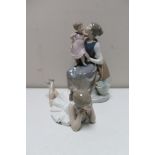 Two Nao figures - mother and child and ballerina