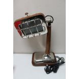 A chrome and leather retro style table lamp