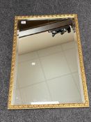 A rectangular bevelled glass mirror